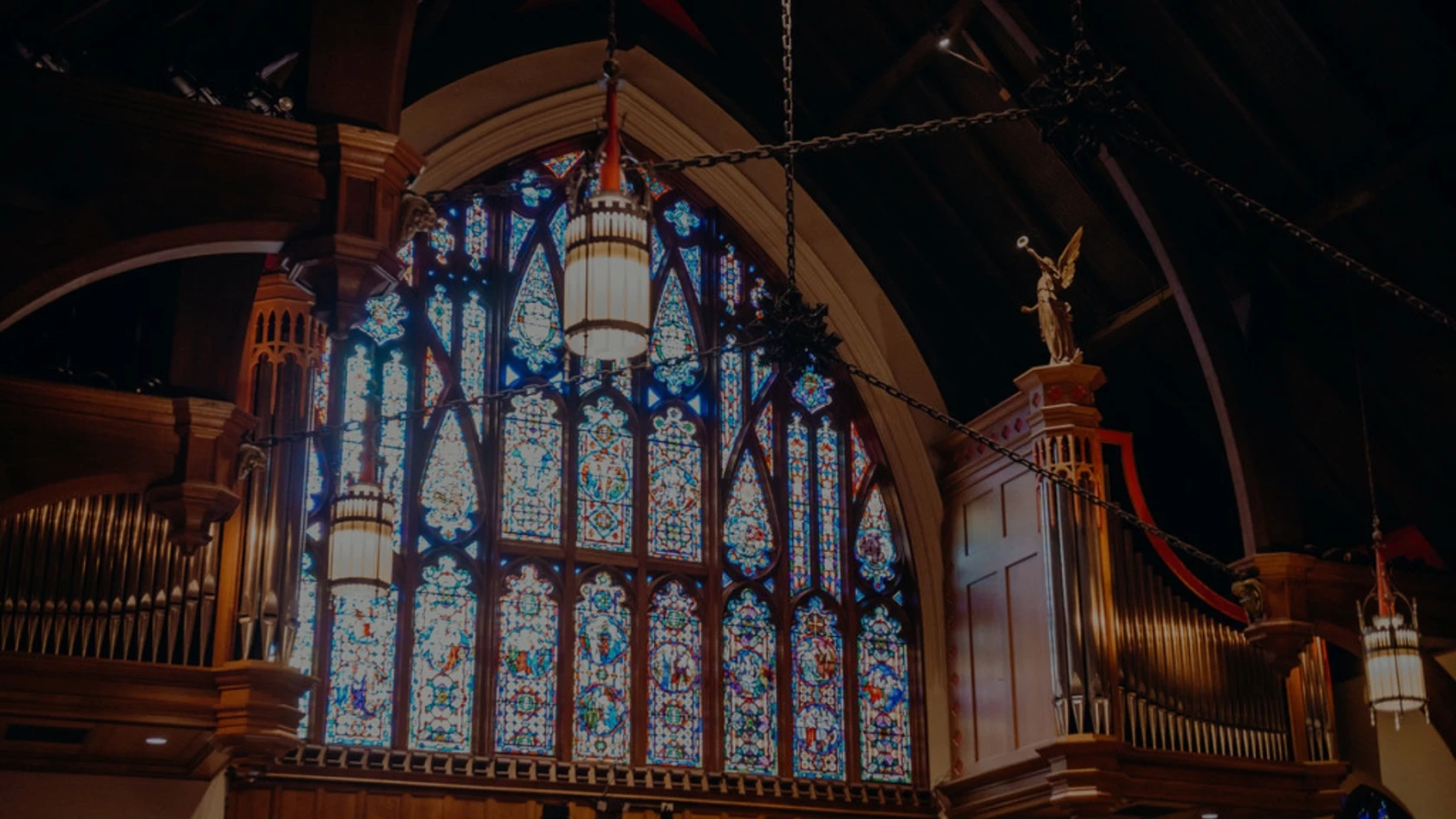 The nave of All Saints' Episcopal Church, Atlanta — stained glass and organ pipes