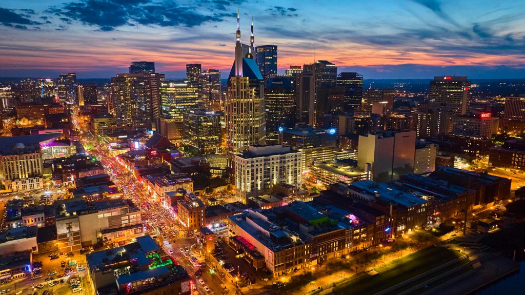 Aerial view of a downtown city skyline at dusk